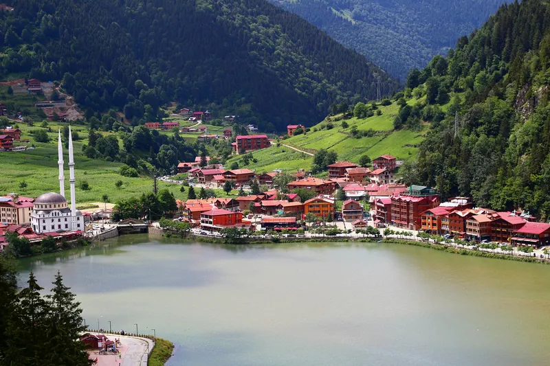 Uzungol lake and its mosque surrounded by green mountains near Trabzon
